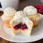 Almond Wedding Cake Cupcakes with Raspberry Filling